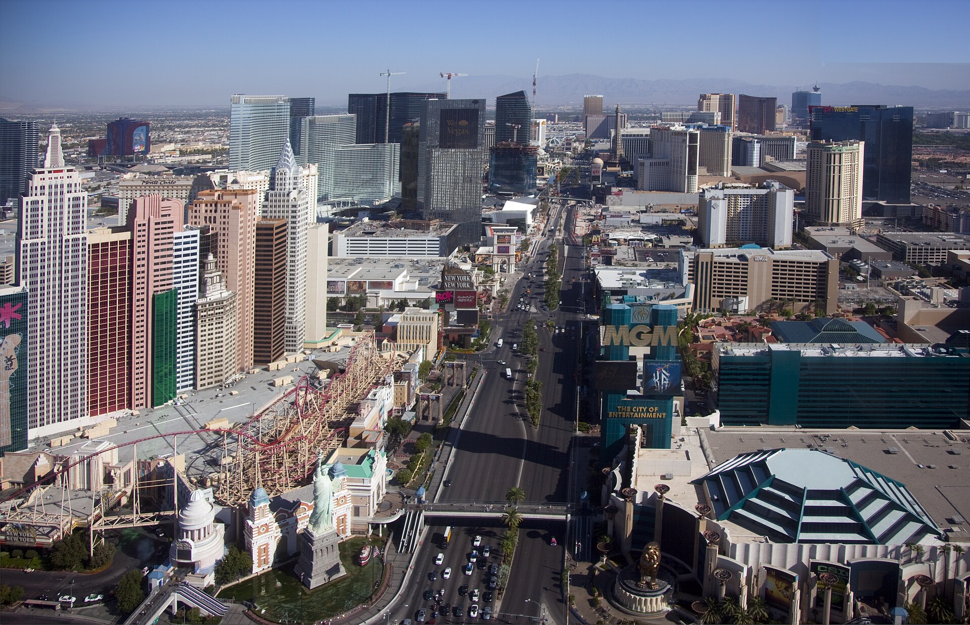The Las Vegas Strip from above on a clear day, lined with casino hotels and towers.