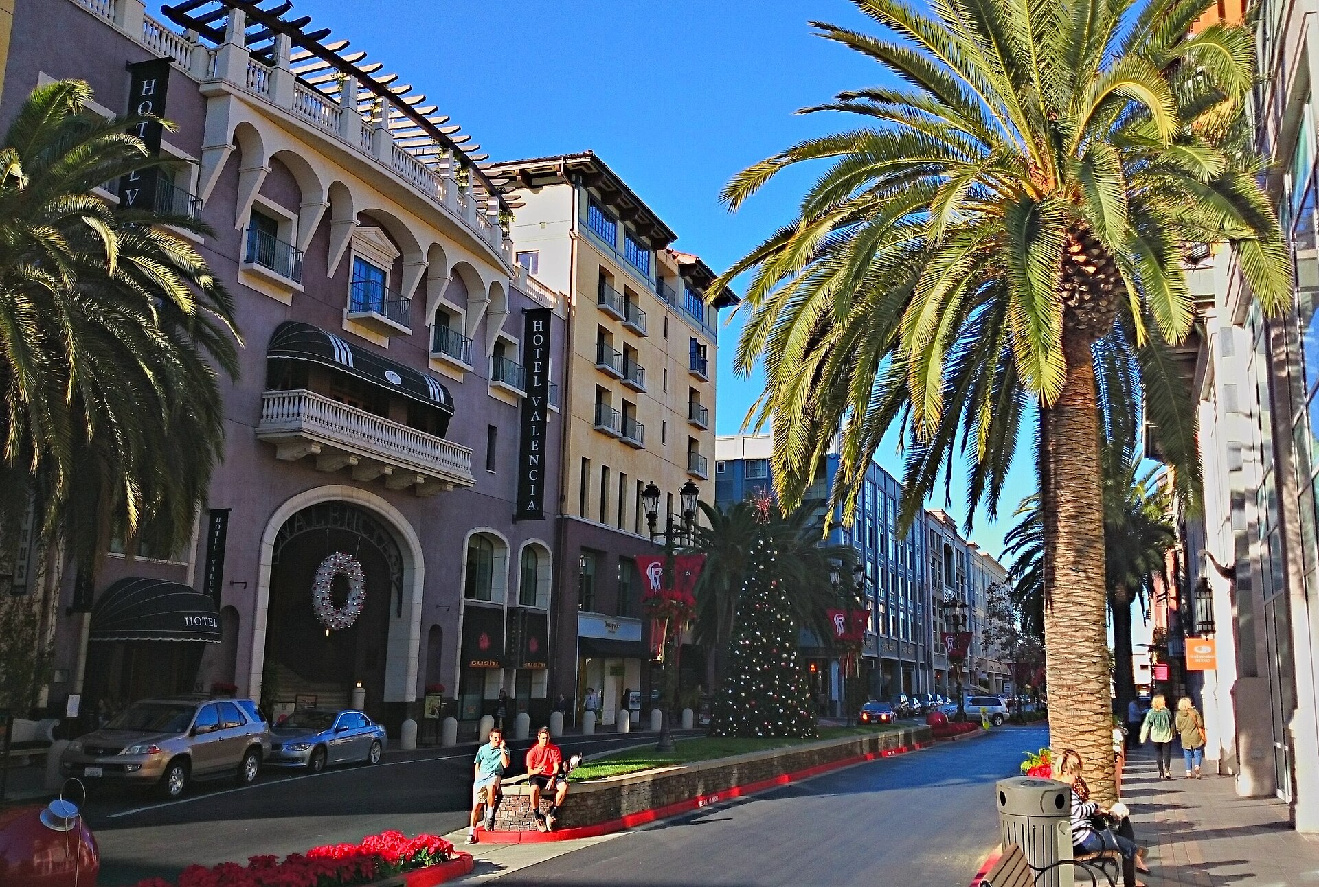 Palm trees and the Valencia Hotel along Santana Row in San Jose on a sunny day.