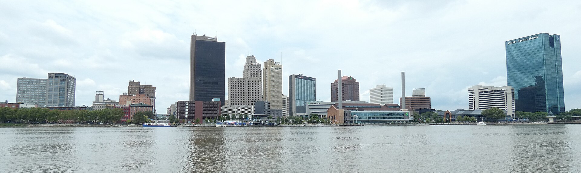 Downtown Toledo's towers along the Maumee River on a summer day.