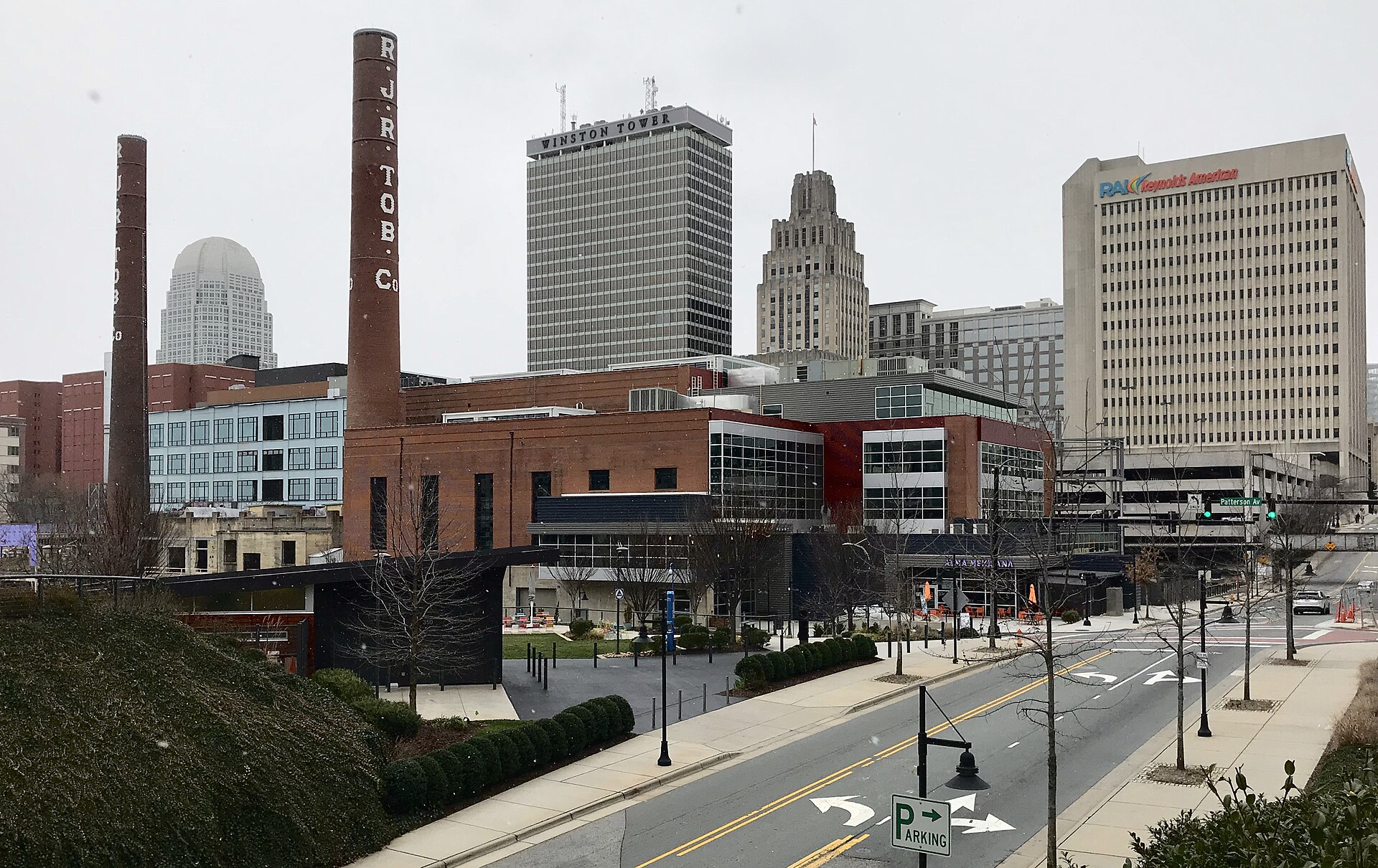 Skyline of downtown Winston-Salem with the redeveloped Bailey Power Plant in the foreground and 100 North Main Street, Winston Tower, the Reynolds Building, and