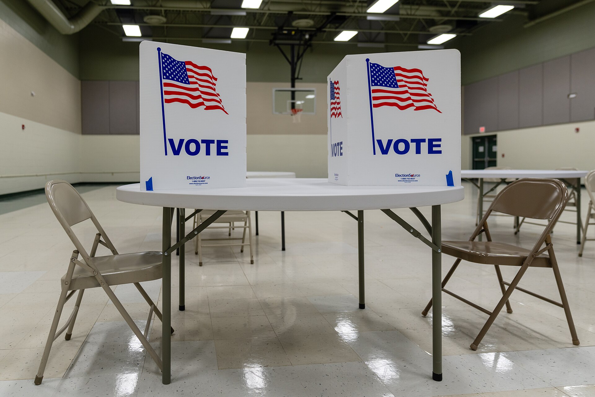 Two voting booths on a table in an empty polling place in Grand Rapids, Minnesota.